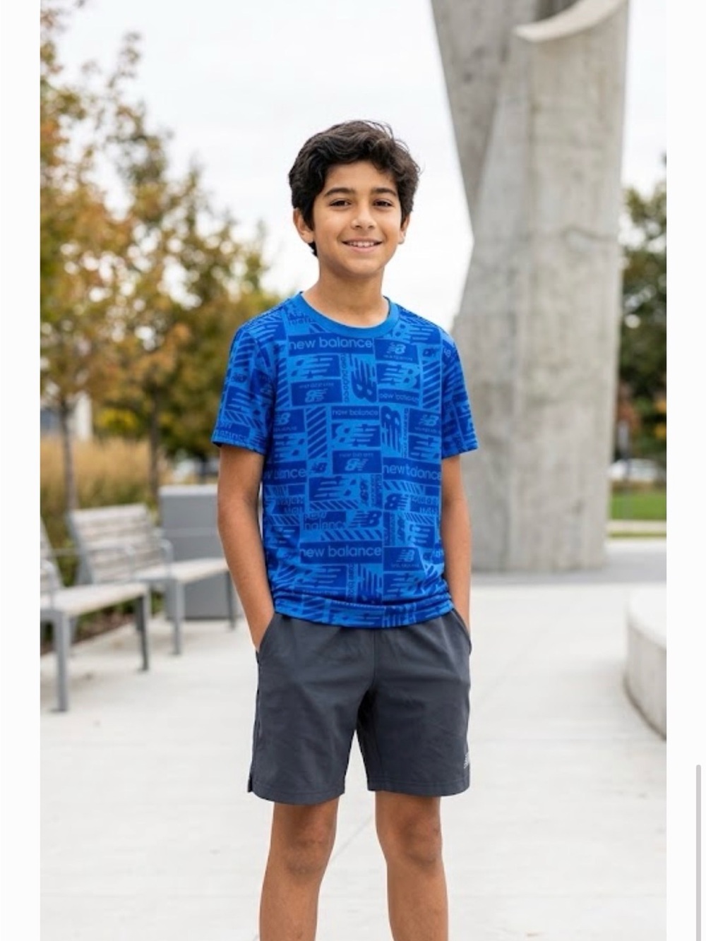 New Balance, Dri fit kids size 12 youth Blue Printed Short Sleeve T-Shirt A01511